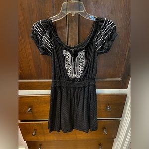 Topshop mini off the shoulder black dress with dots.